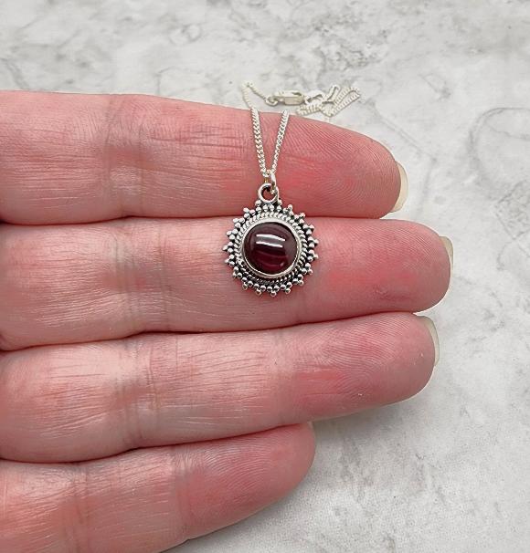 Round Sunburst Garnet Necklace - January Birthstone