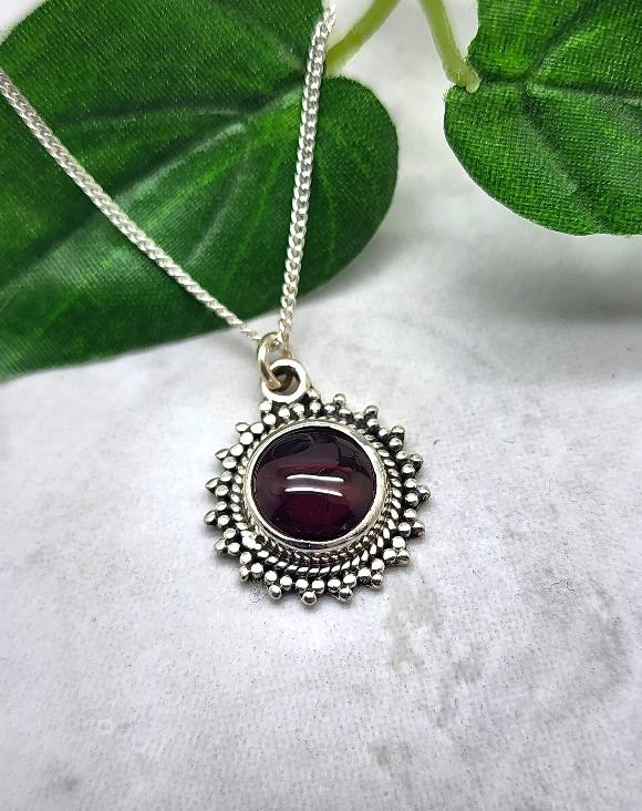 Round Sunburst Garnet Necklace - January Birthstone