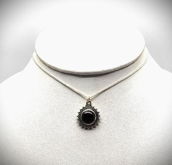 Round Sunburst Garnet Necklace - January Birthstone