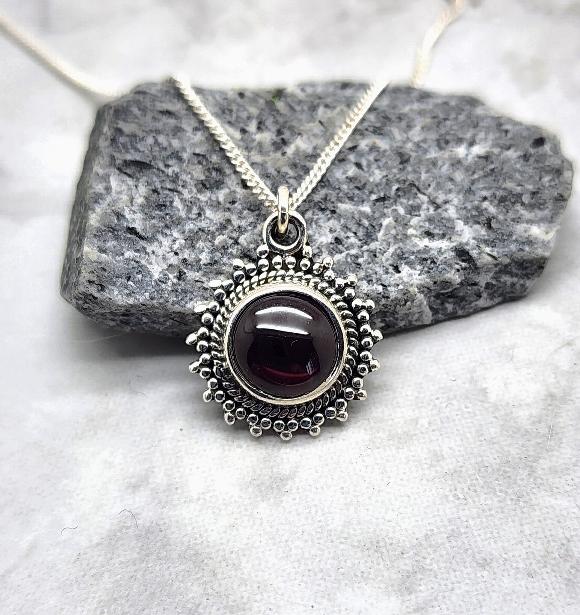 Round Sunburst Garnet Necklace - January Birthstone