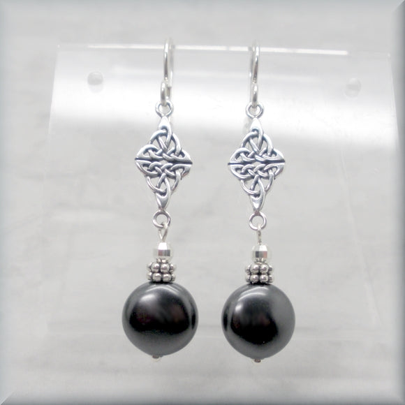 Coin pearl earrings with Celtic knot accent