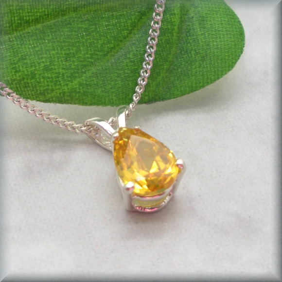 Golden yellow pear shaped cubic zirconia in sterling silver setting by Bonny Jewelry