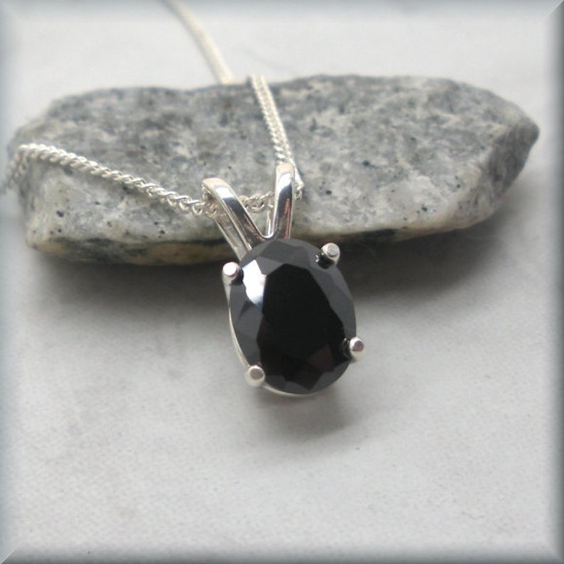 oval black cz pendant in sterling silver setting