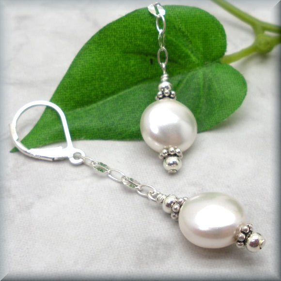 
                  
                    Long white pearl dangle sterling silver earrings 
                  
                
