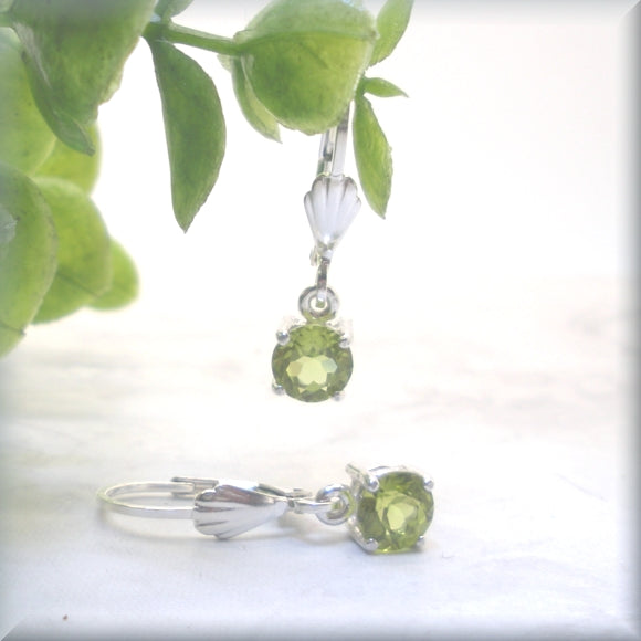 round faceted peridot earrings