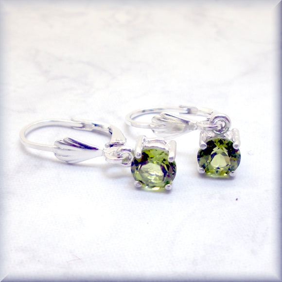 august birthstone earrings with round peridot faceted stones
