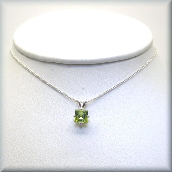 Peridot gemstone necklace on sterling silver curb chain