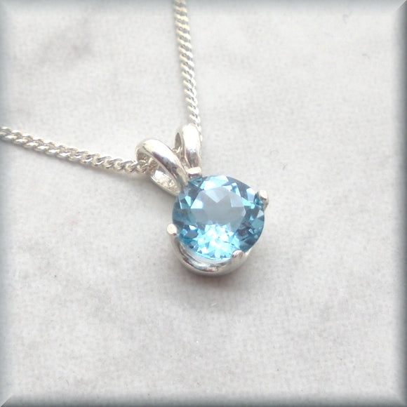 swiss blue topaz solitaire pendant by Bonny Jewelry