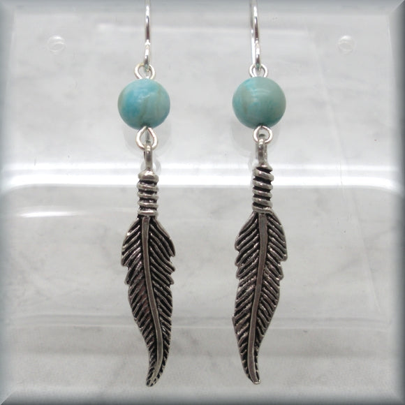 sterling silver feather dangle earrings
