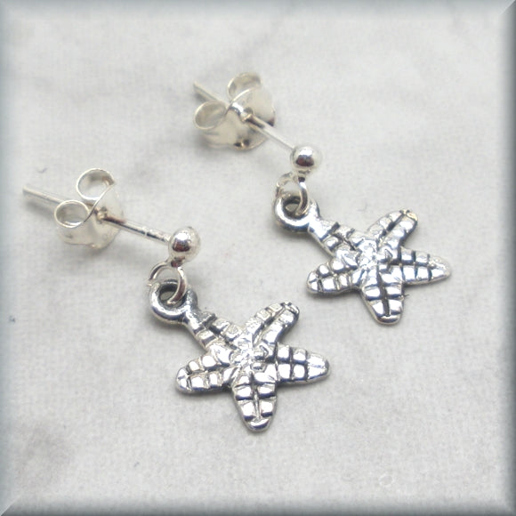 
                  
                    petite sea star earrings in sterling silver
                  
                