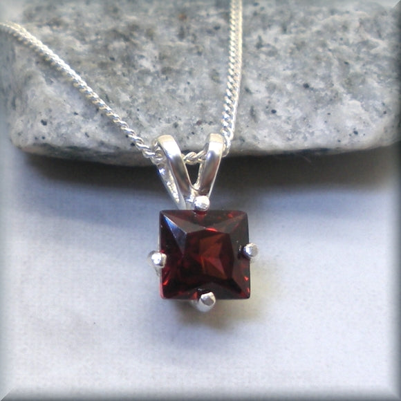
                  
                    Red garnet princess cut set in sterling silver by Bonny Jewelry
                  
                