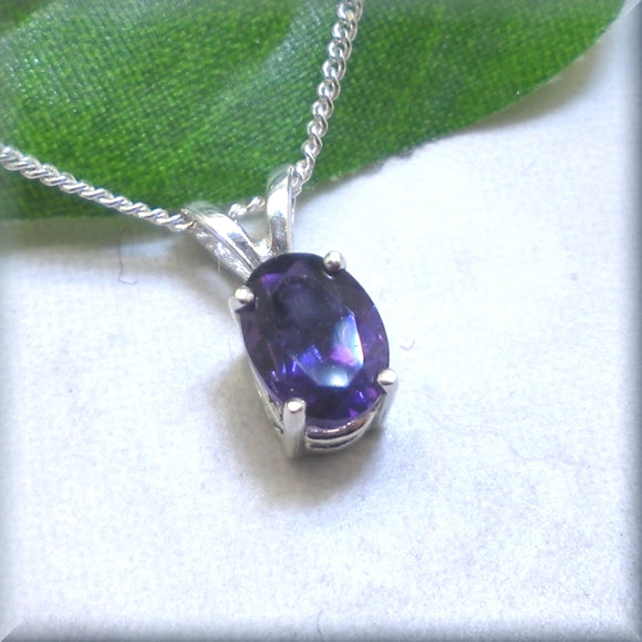
                  
                    faceted amethyst necklace in an oval cut
                  
                