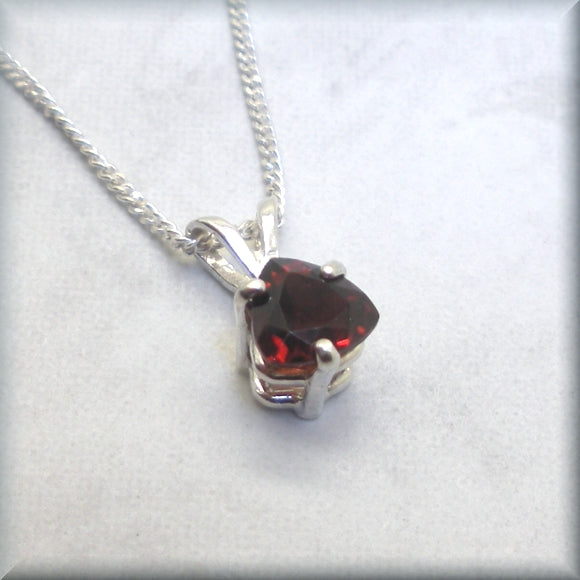 
                  
                    Natural garnet pendant in a faceted trillion cut
                  
                