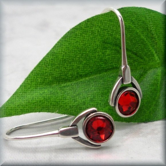 
                  
                    July crystal earrings in sterling silver by Bonny Jewelry
                  
                